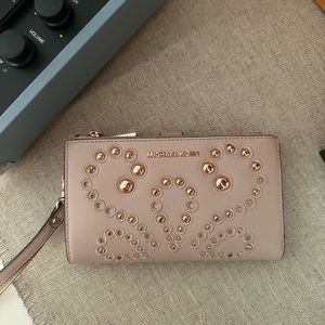 Michael Kors pink zippy phone wallet/wristlet.